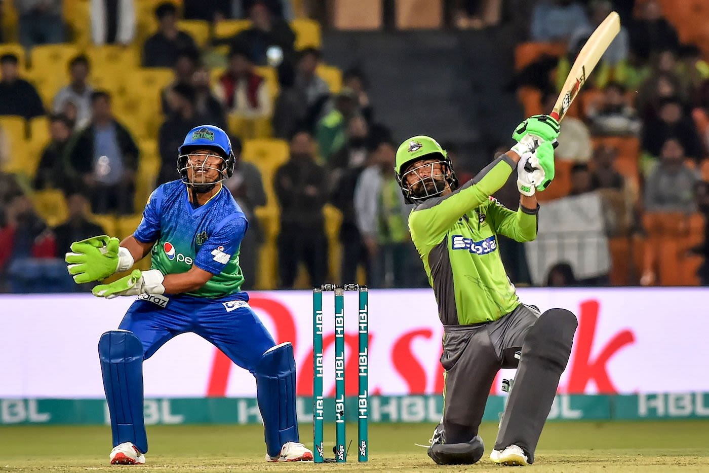 Mohammad Hafeez goes over the off side