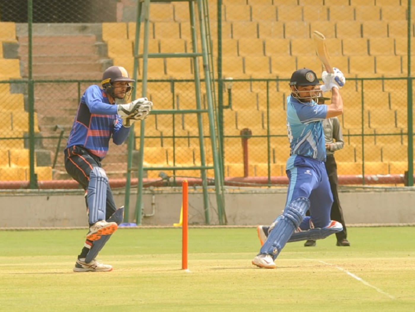 Aniruddha Joshi drives to the off side