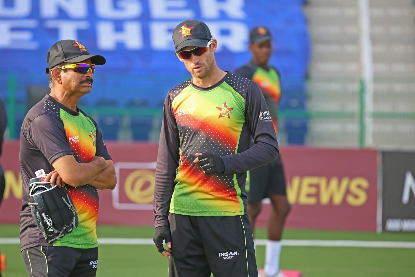 Captain Sean Williams and coach Lalchand Rajput have a chat