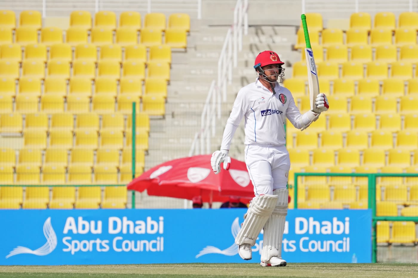 Nasir Jamal raises his bat on scoring a maiden Test half-century