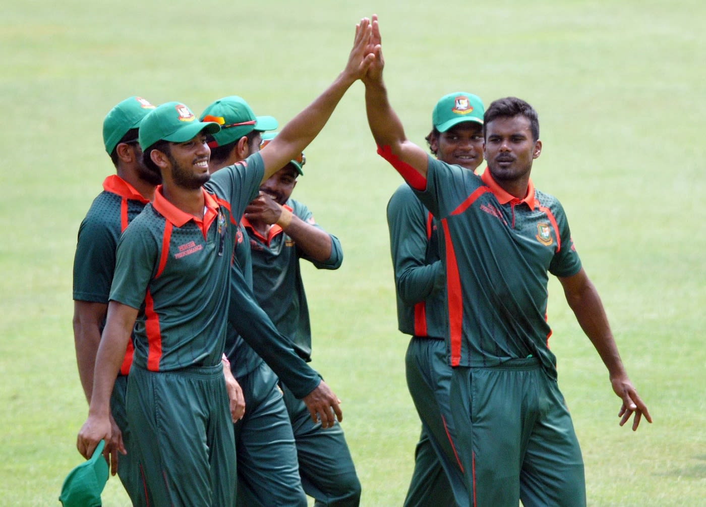 Bangladesh Emerging Team pacer Sumon Khan celebrates his four-wicket haul with his team-mates