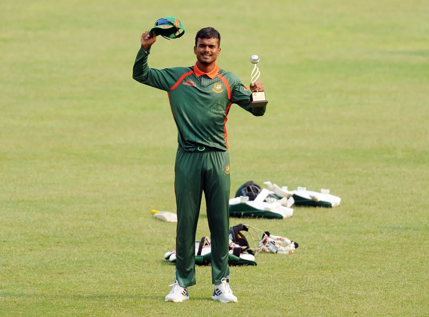 Bangladesh Emerging Team pacer Sumon Khan poses with his Player-of-the-Match Trophy