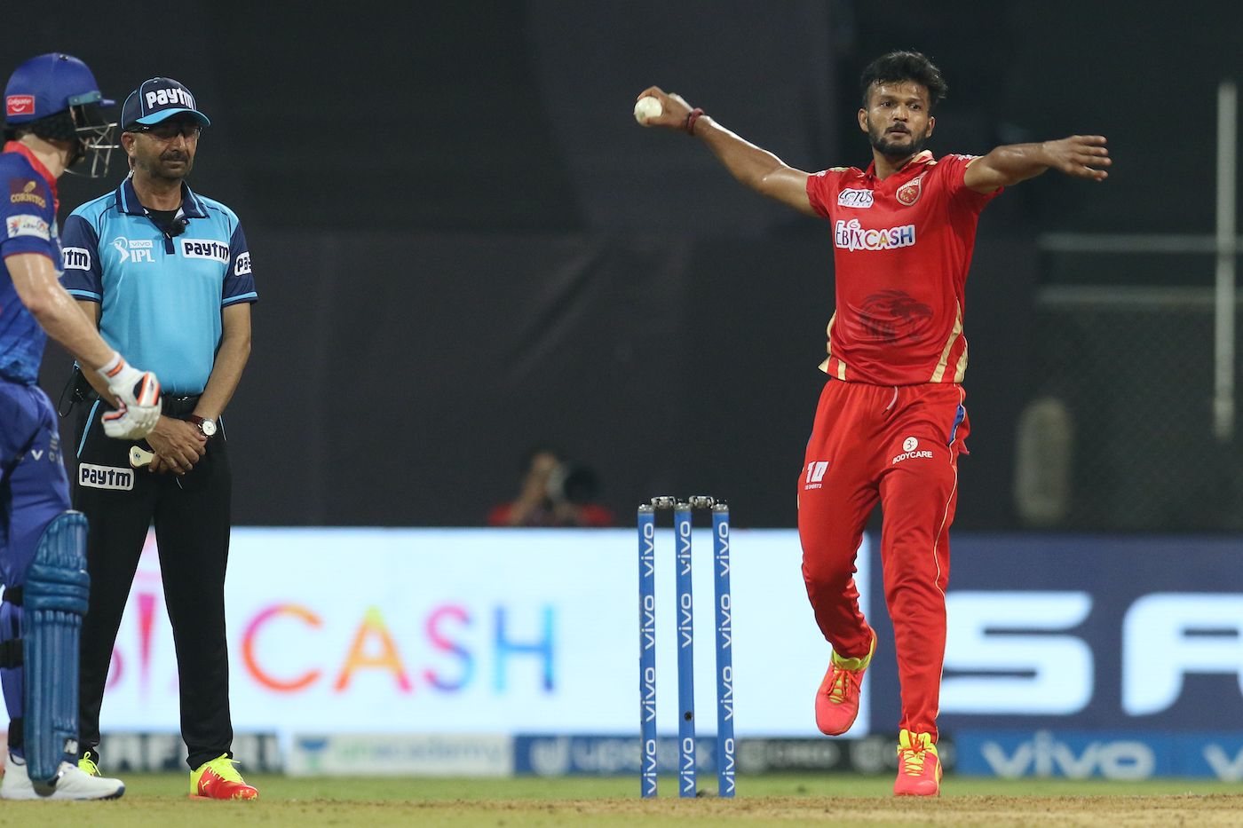 Jalaj Saxena runs in to bowl