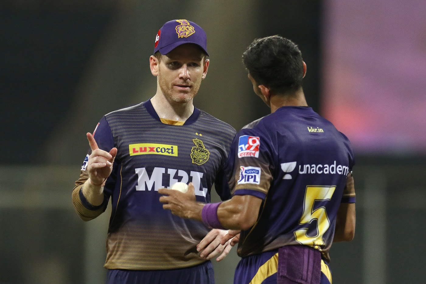 Eoin Morgan has a chat with his young fast bowler Kamlesh Nagarkoti