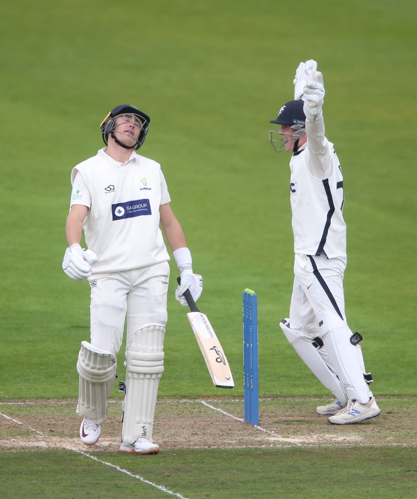 Harry Duke, Yorkshire's debutant wicketkeeper, joins the celebrations as Marnus Labuschagne falls lbw