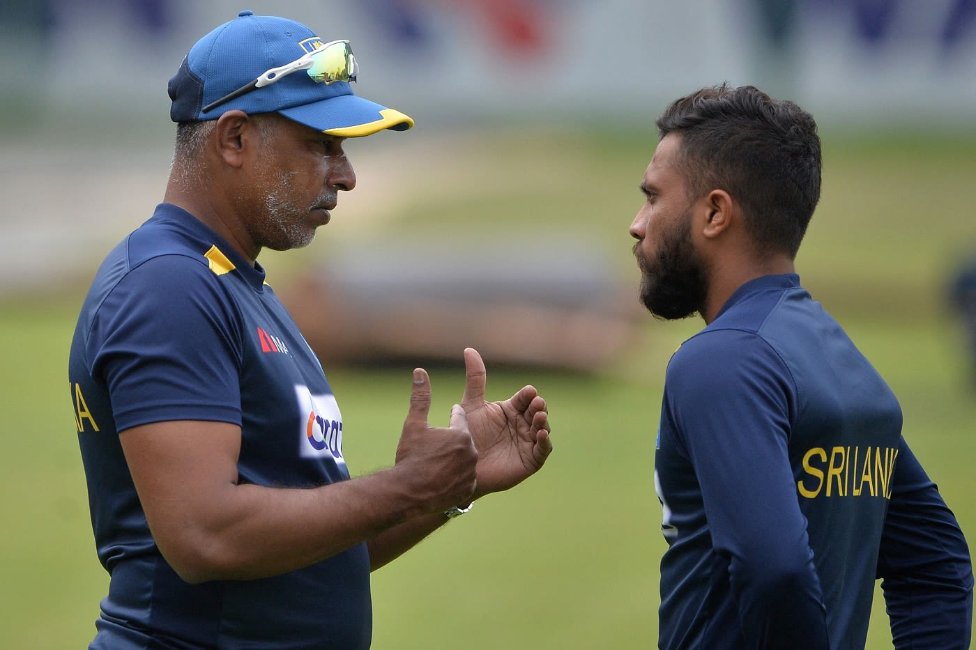 Sri Lanka bowling coach Chaminda Vaas has a chat with Kusal Mendis during training