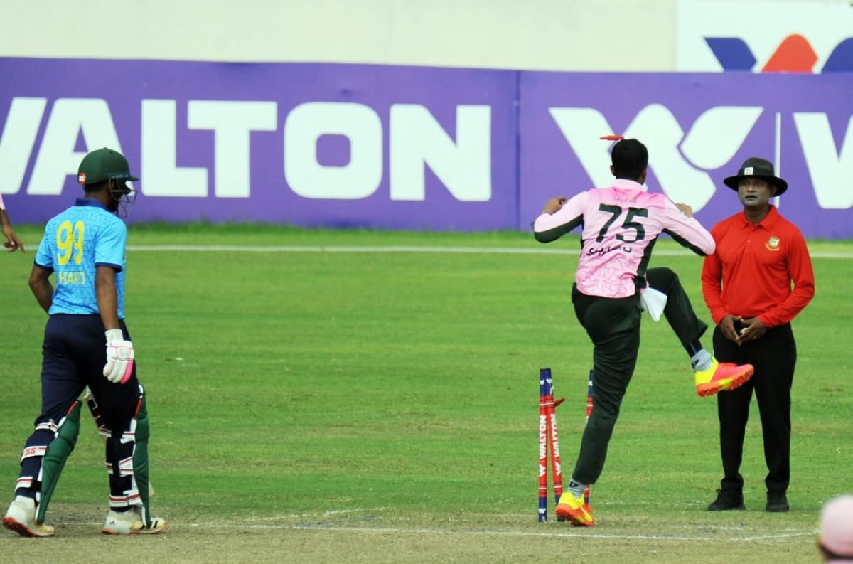 Shakib Al Hasan kicks the stumps in anger after having an lbw appeal turned down by umpire Imran Parvez