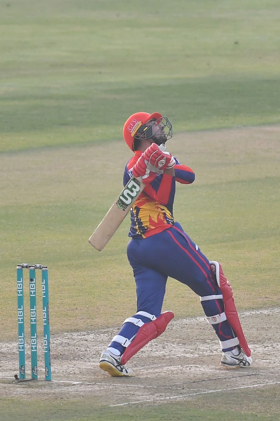 Danish Aziz swings one high and long towards midwicket