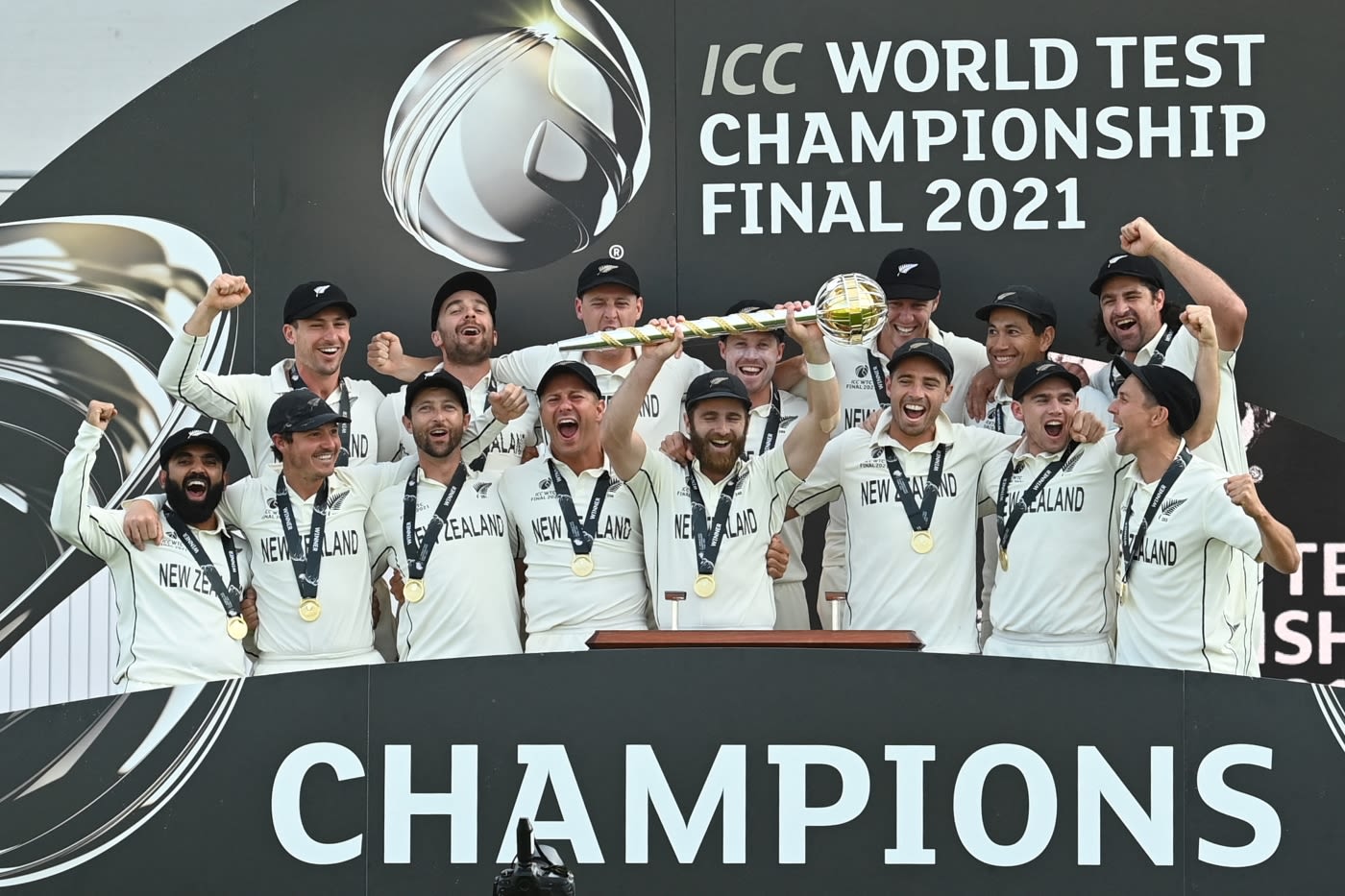 New Zealand's 15 for the WTC final with their prize: (front L to R) Ajaz Patel, BJ Watling, Devon Conway, Neil Wagner, Kane Williamson, Tim Southee, Tom Latham, Trent Boult, (back L to R), Will Young, Tom Blundell, Matt Henry, Henry Nicholls, Kyle Jamieson, Ross Taylor, Colin de Grandhomme