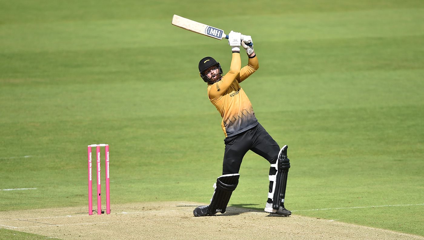 Arron Lilley hacks down the ground