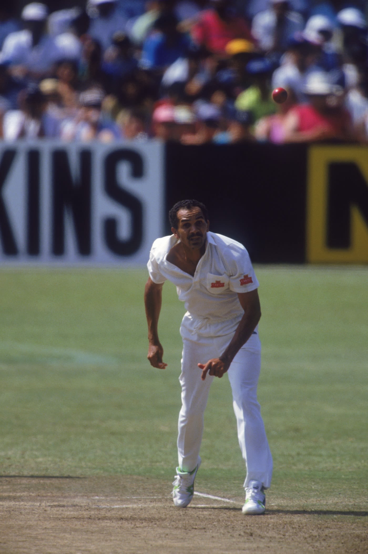 Omar Henry bowling his left-arm spin on Test debut