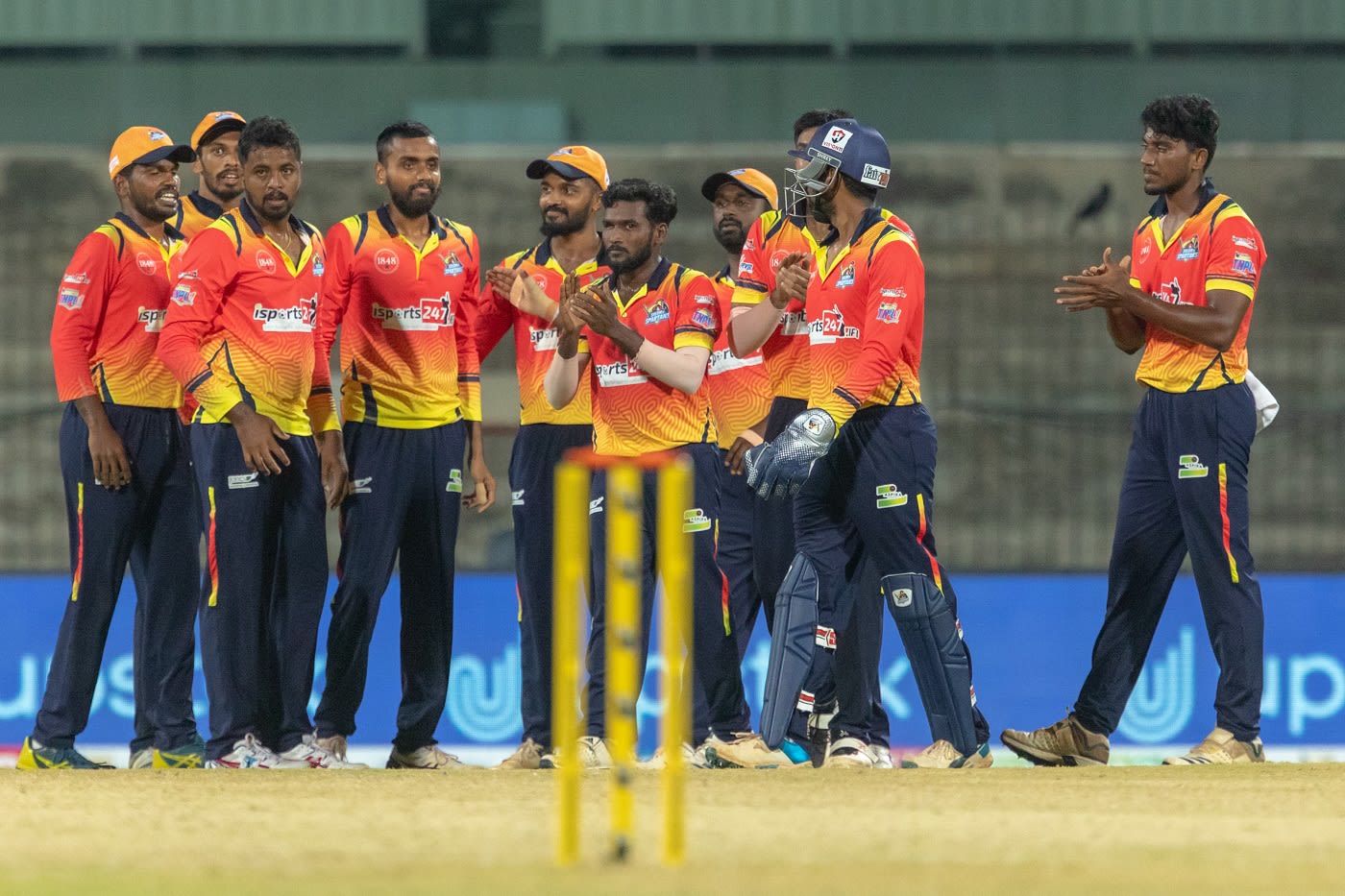 G Periyaswamy is mobbed by his team-mates