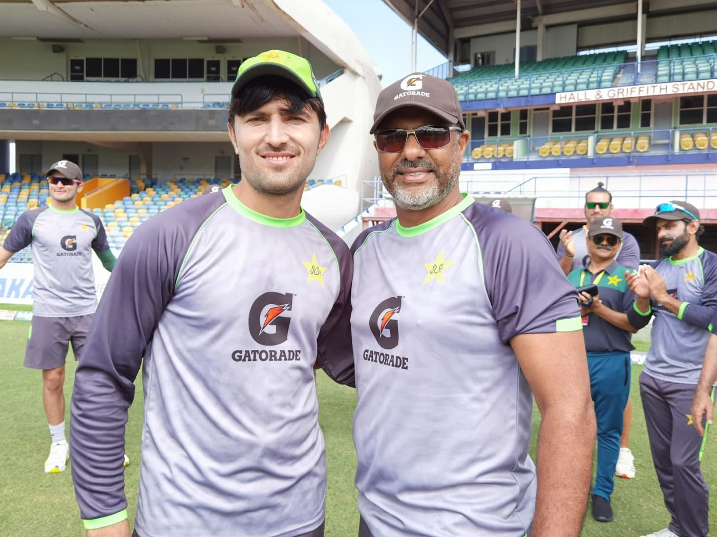 Debutant Mohammad Wasim poses with his Pakistan cap alongside Waqar Younis