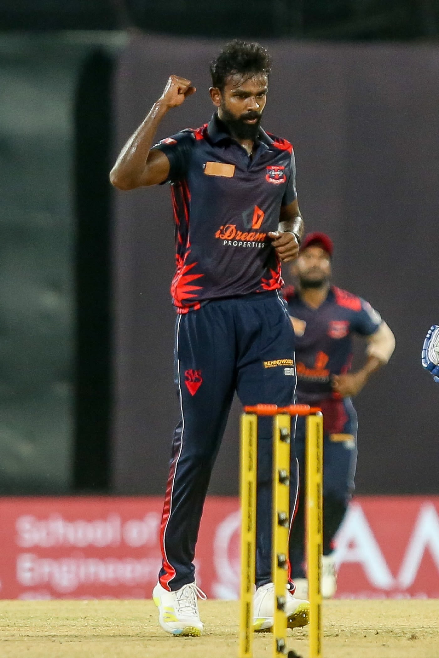 Aswin Crist celebrates a wicket