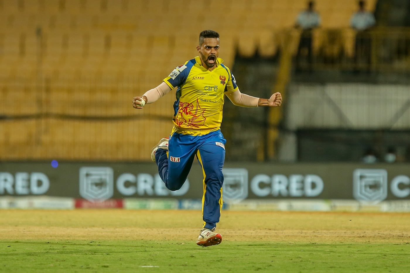 L Vignesh is pumped after taking a wicket