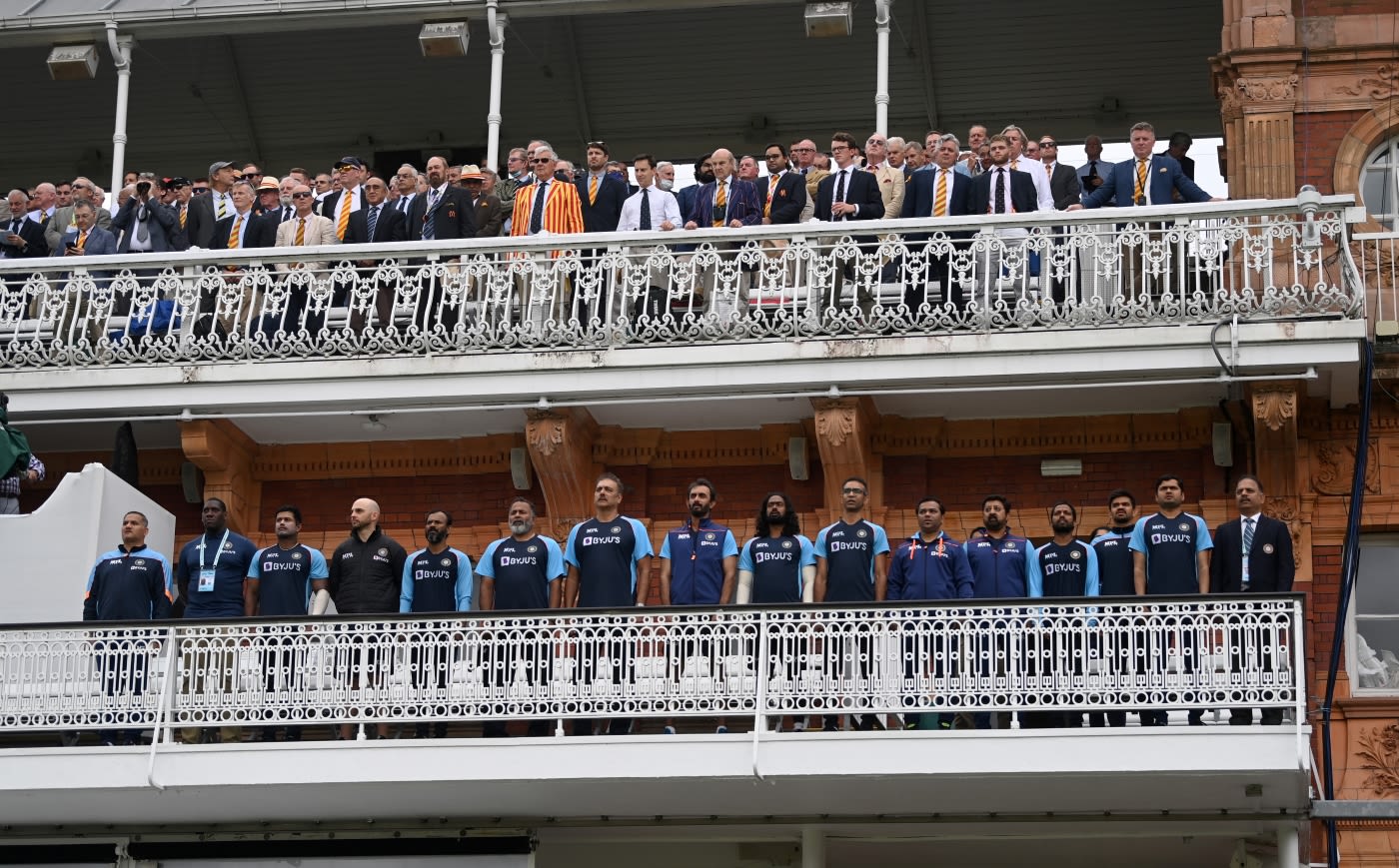 India's support staff line up for the national anthem
