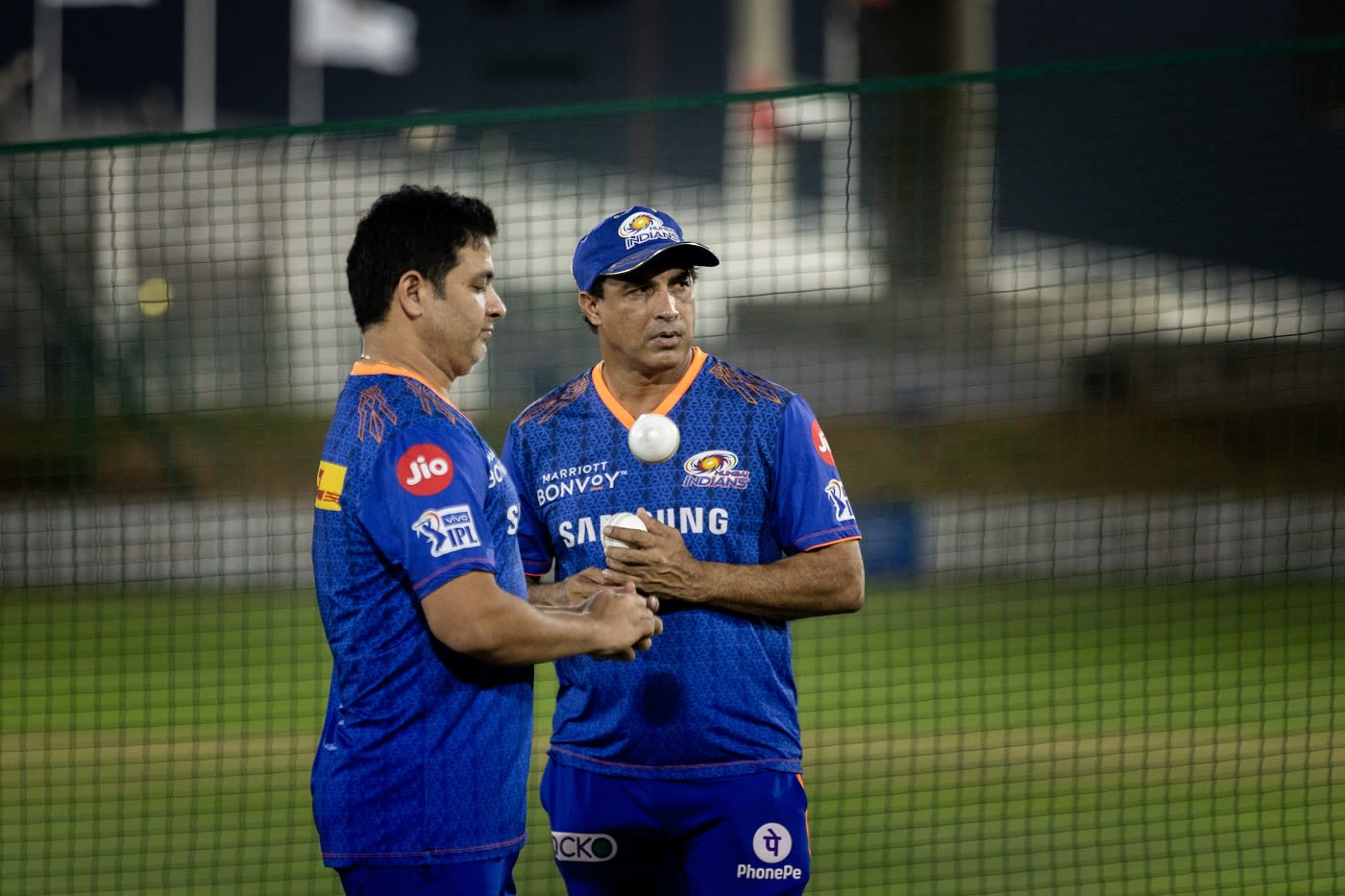 Mumbai Indians' Piyush Chawla and batting coach Robin Singh during practice