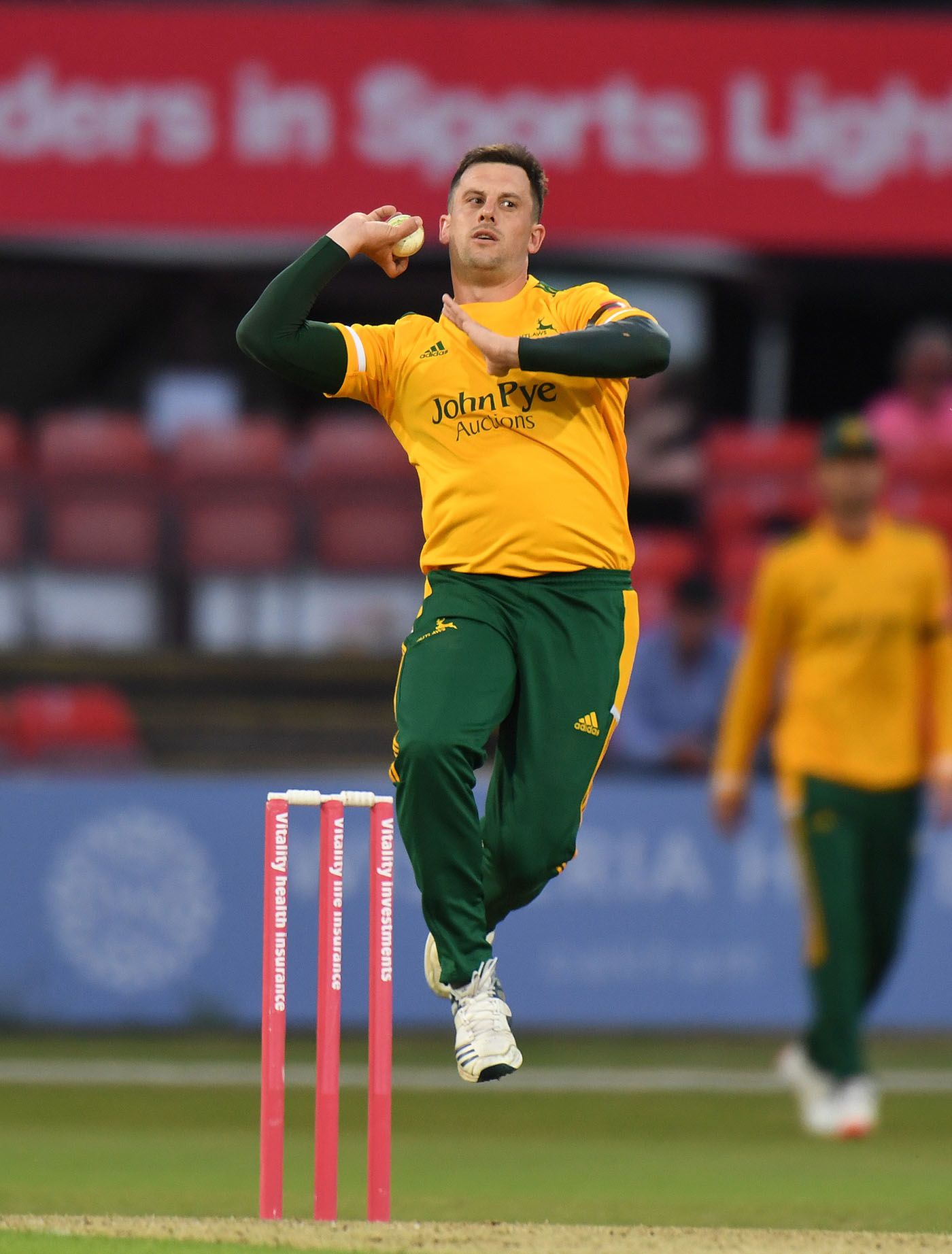 Steven Mullaney in his bowling action