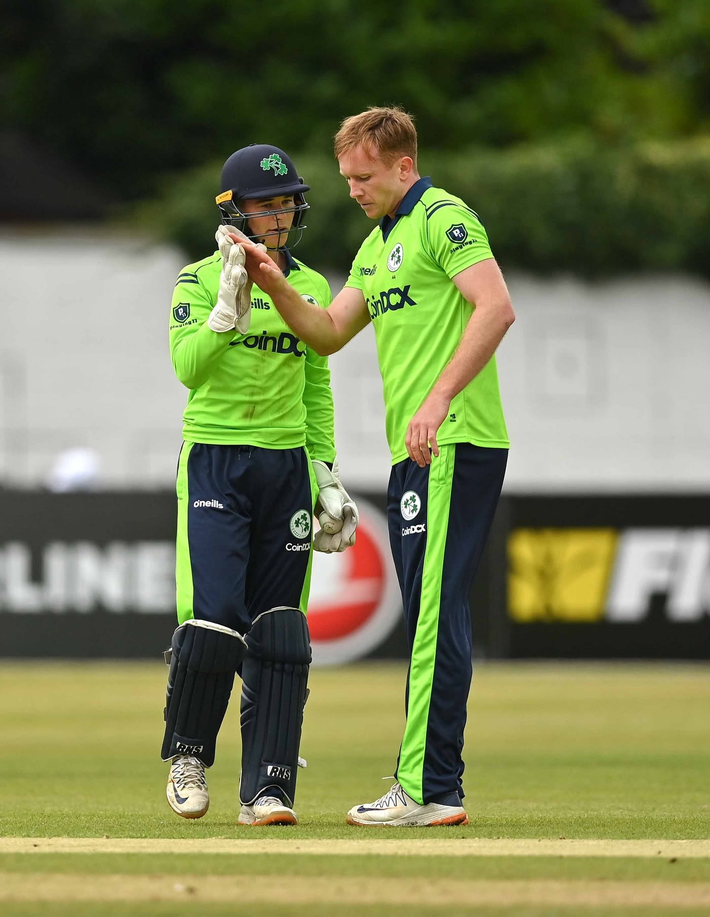 Wicketkeeper Neil Rock congratulates Shane Getkate