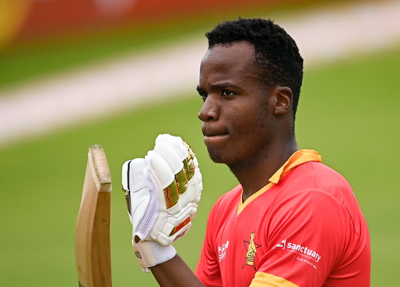Milton Shumba walks back at the end of Zimbabwe's innings