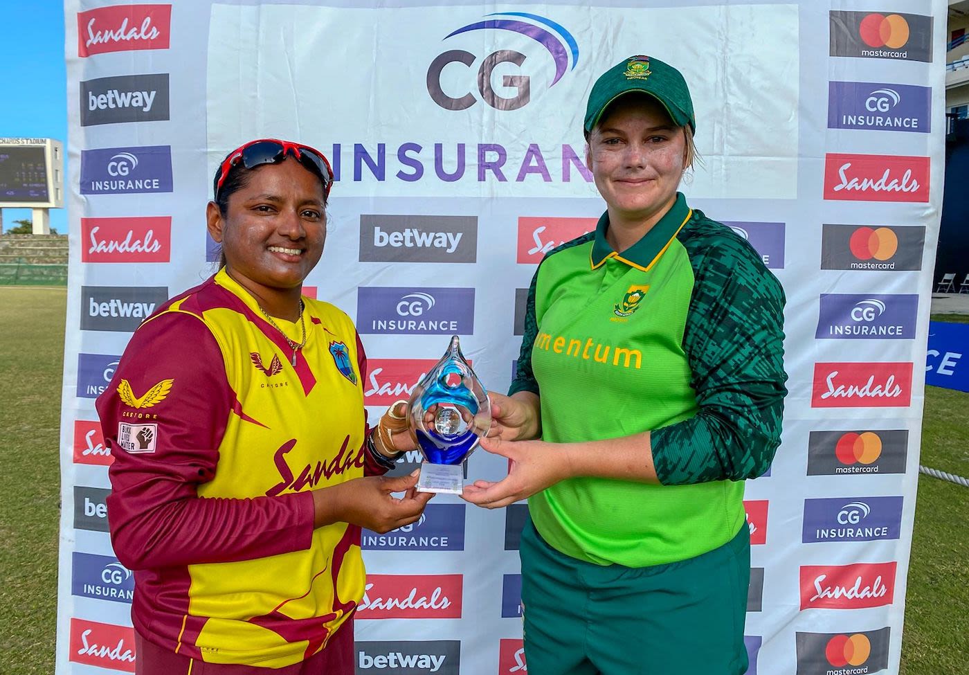 Anisa Mohammed and Dane van Niekerk shared the T20I trophy