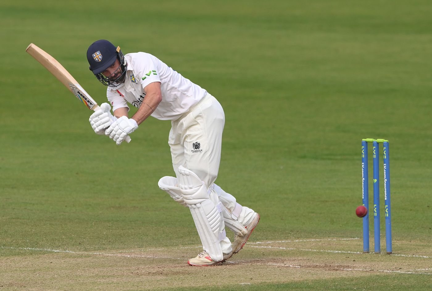 Ned Eckersley clips to leg during his half-century