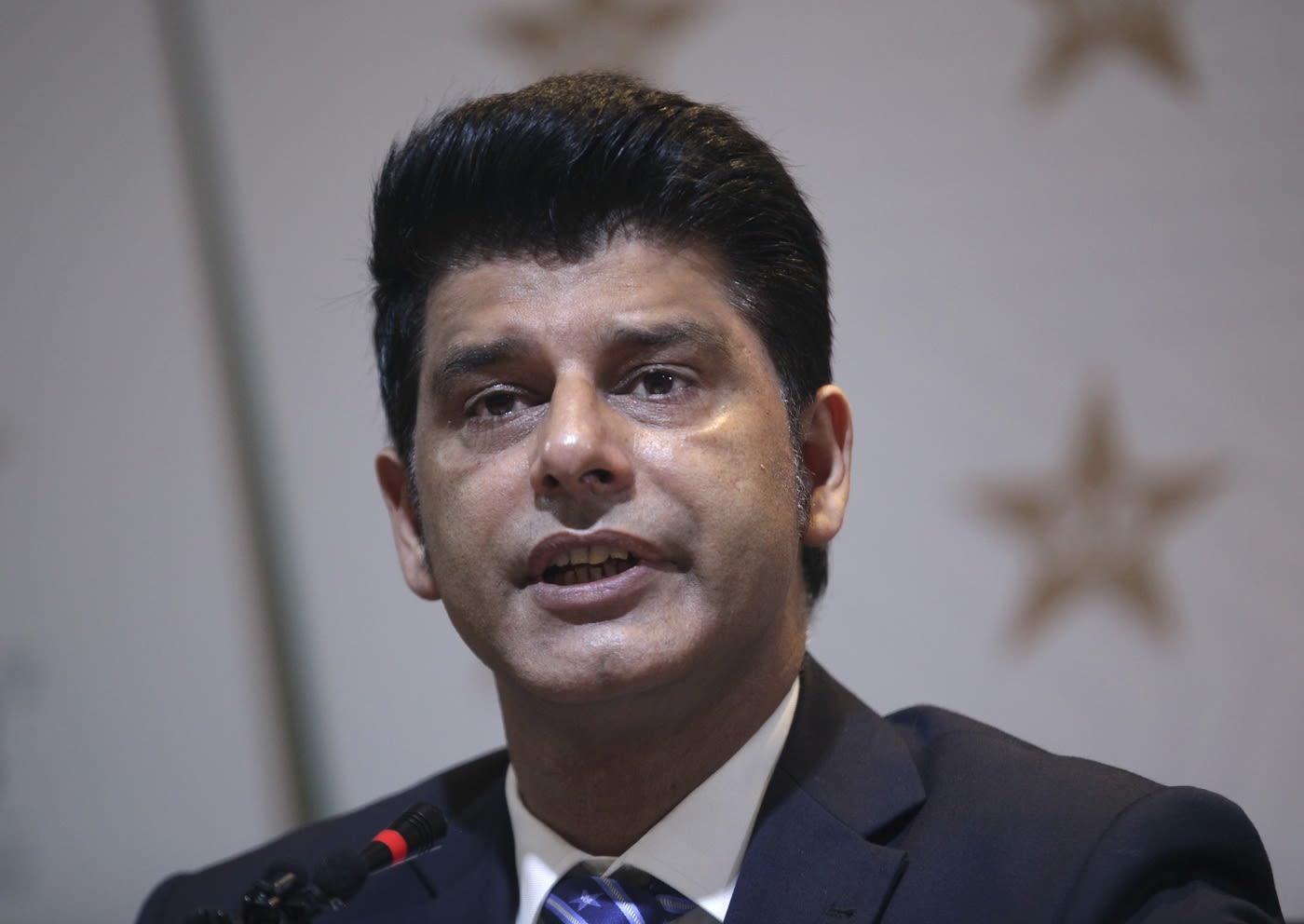 Chief selector Mohammad Wasim speaks during a press conference to announce the squad for the T20 World Cup