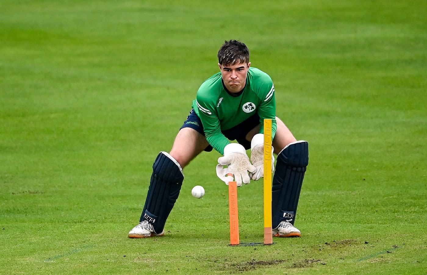 Neil Rock practises before the match