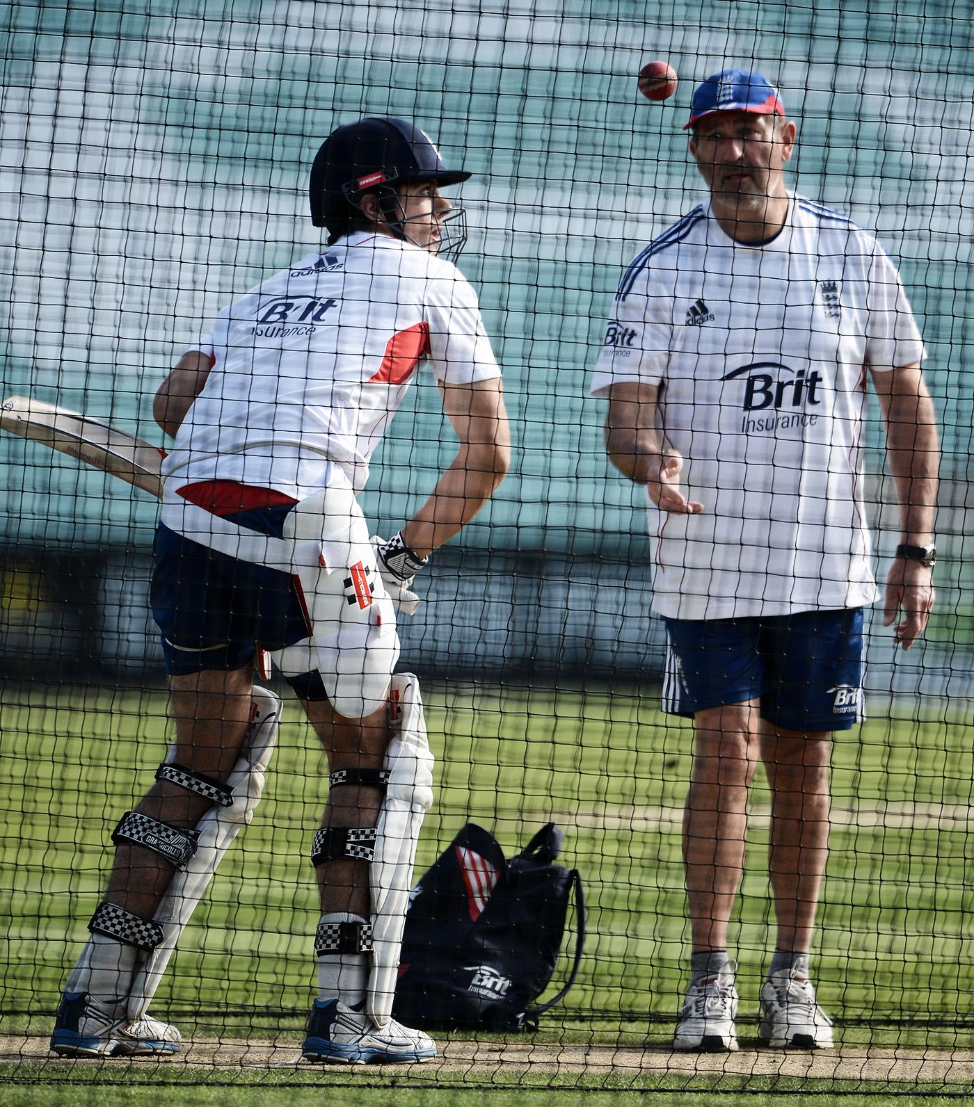 Graham Gooch chats with Alastair Cook in the nets