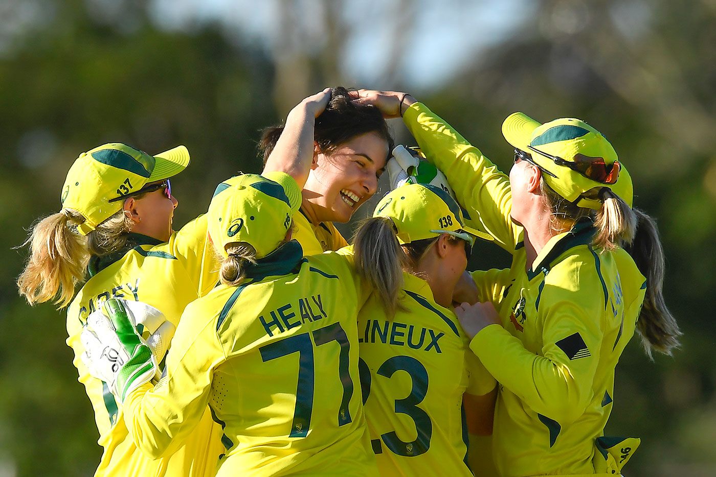 Stella Campbell is congratulated in her first international wicket