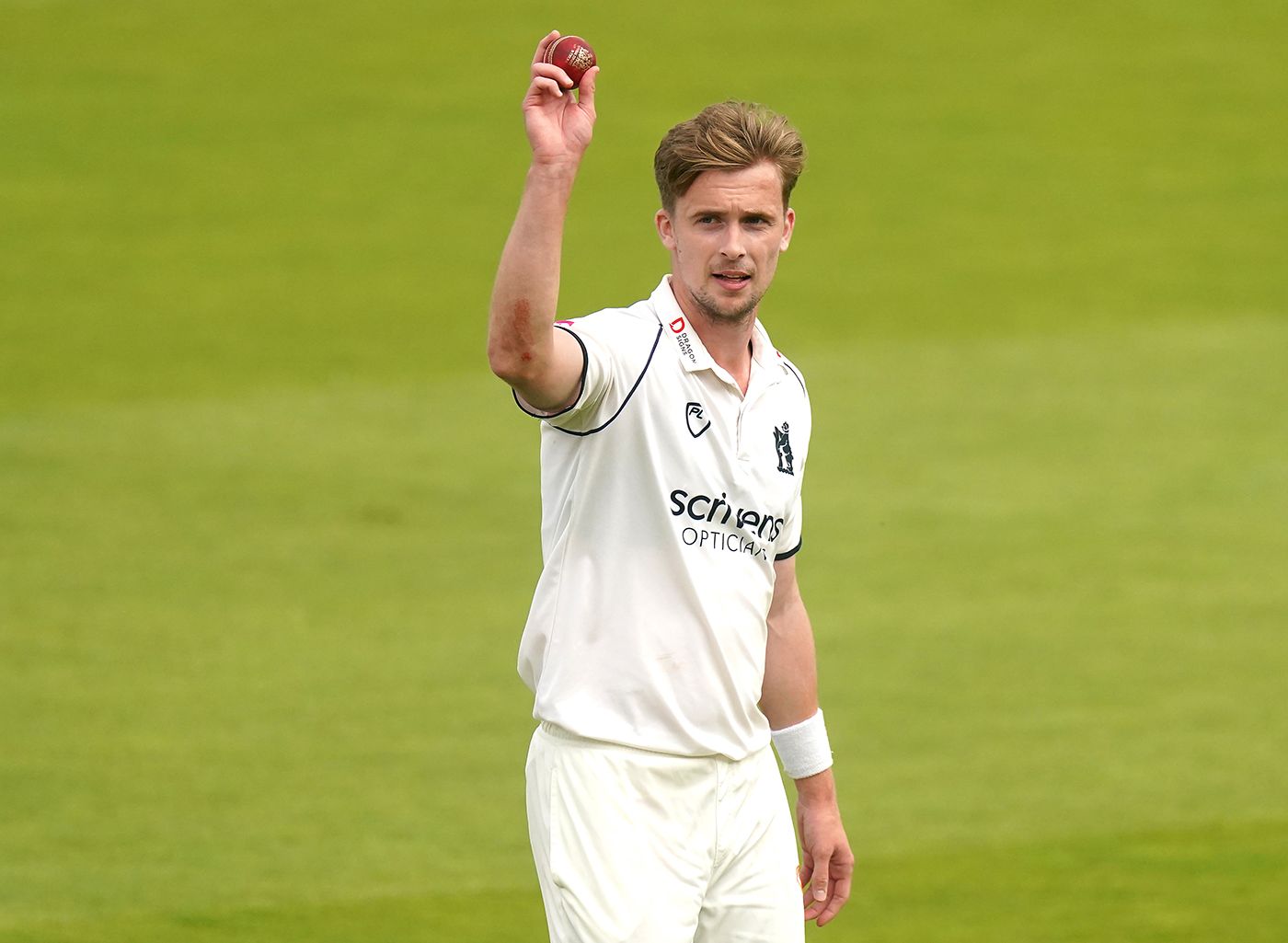 Craig Miles holds the ball aloft for his five-for