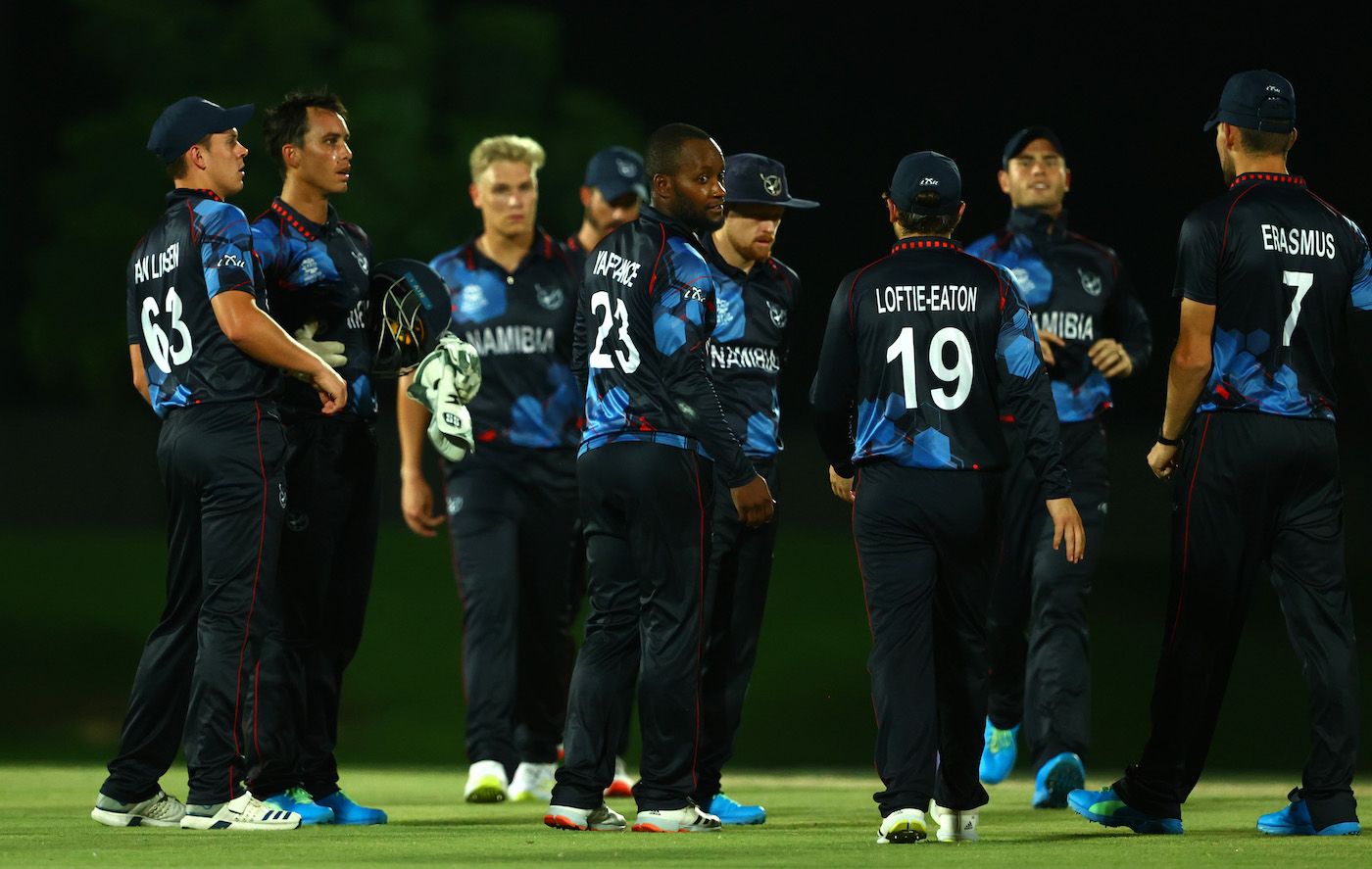 Pikky Ya France celebrates a dismissal with team-mates