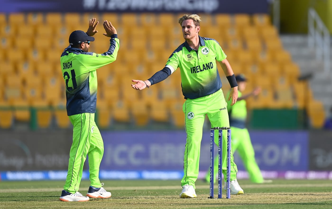 Simi Singh and Mark Adair celebrate a wicket