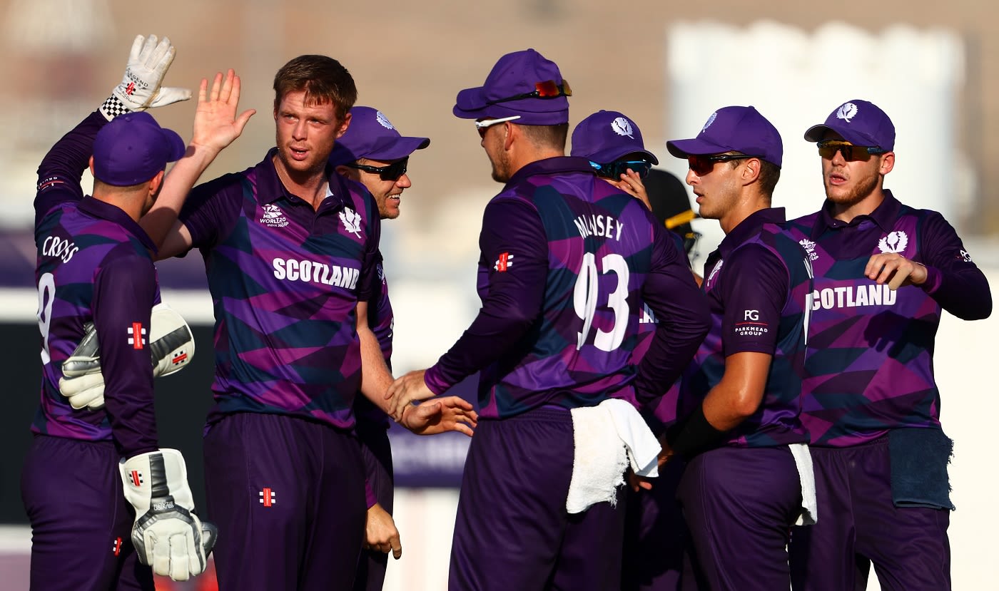 Alasdair Evans celebrates the wicket of Assad Vala
