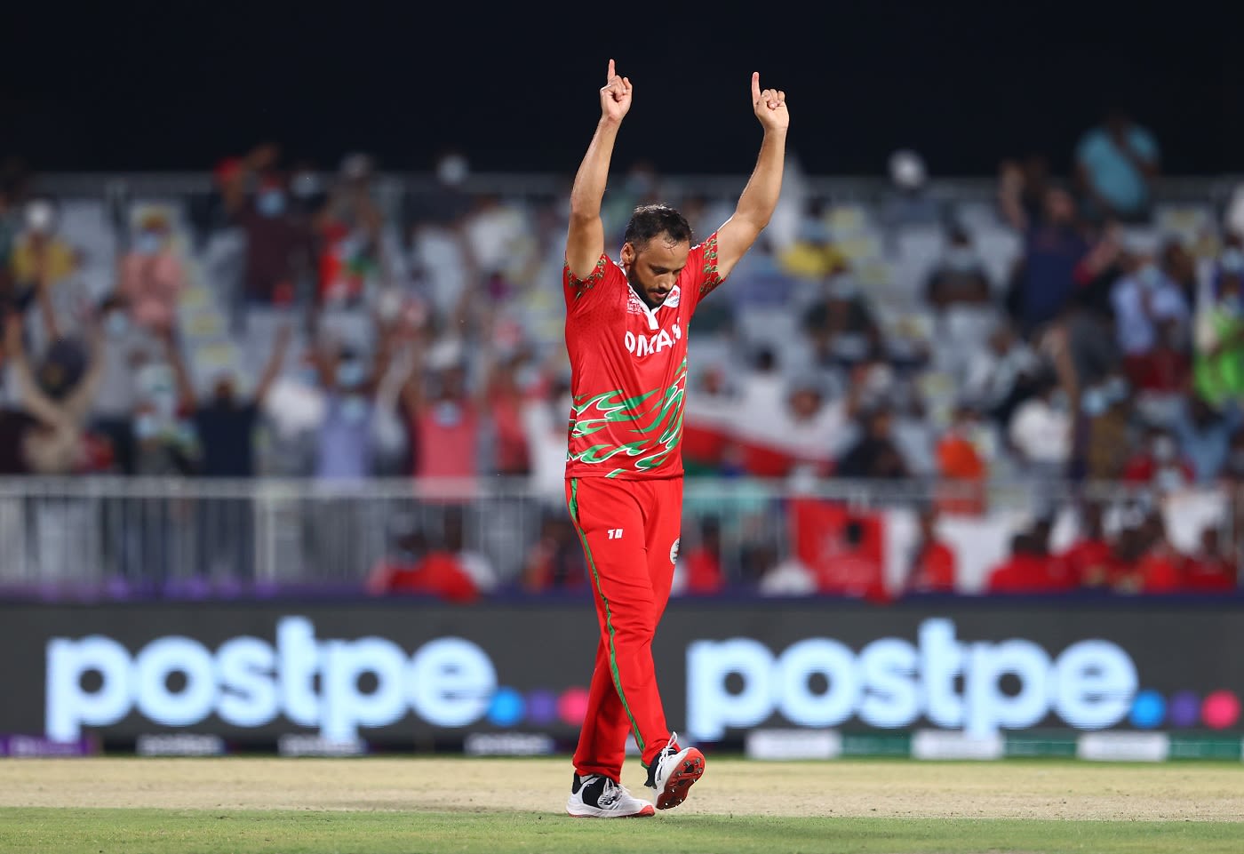 Fayyaz Butt has his hands in the air after getting George Munsey