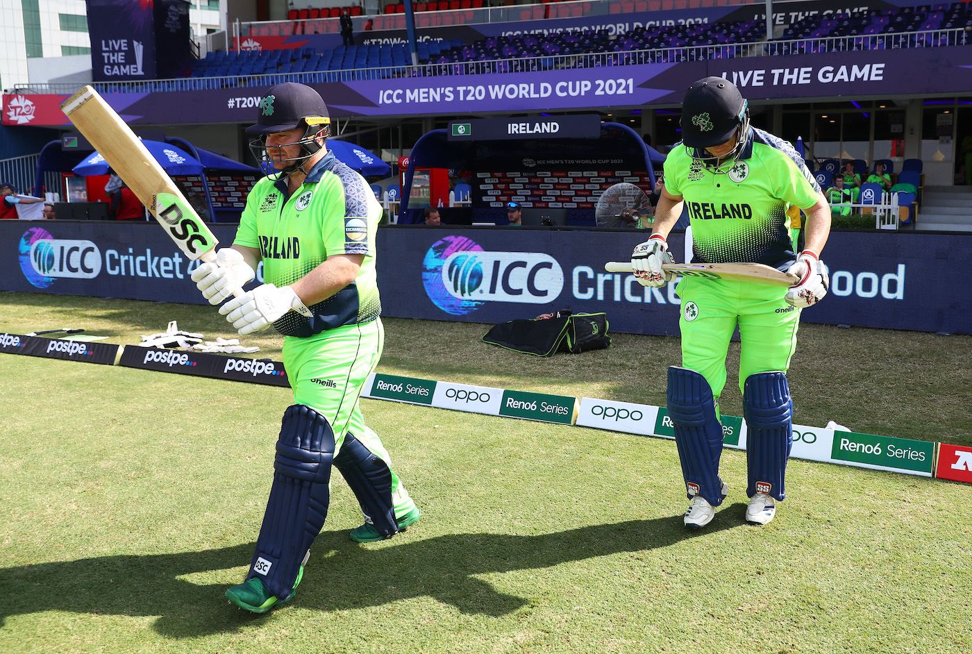 Paul Stirling and Kevin O'Brien walk out to bat