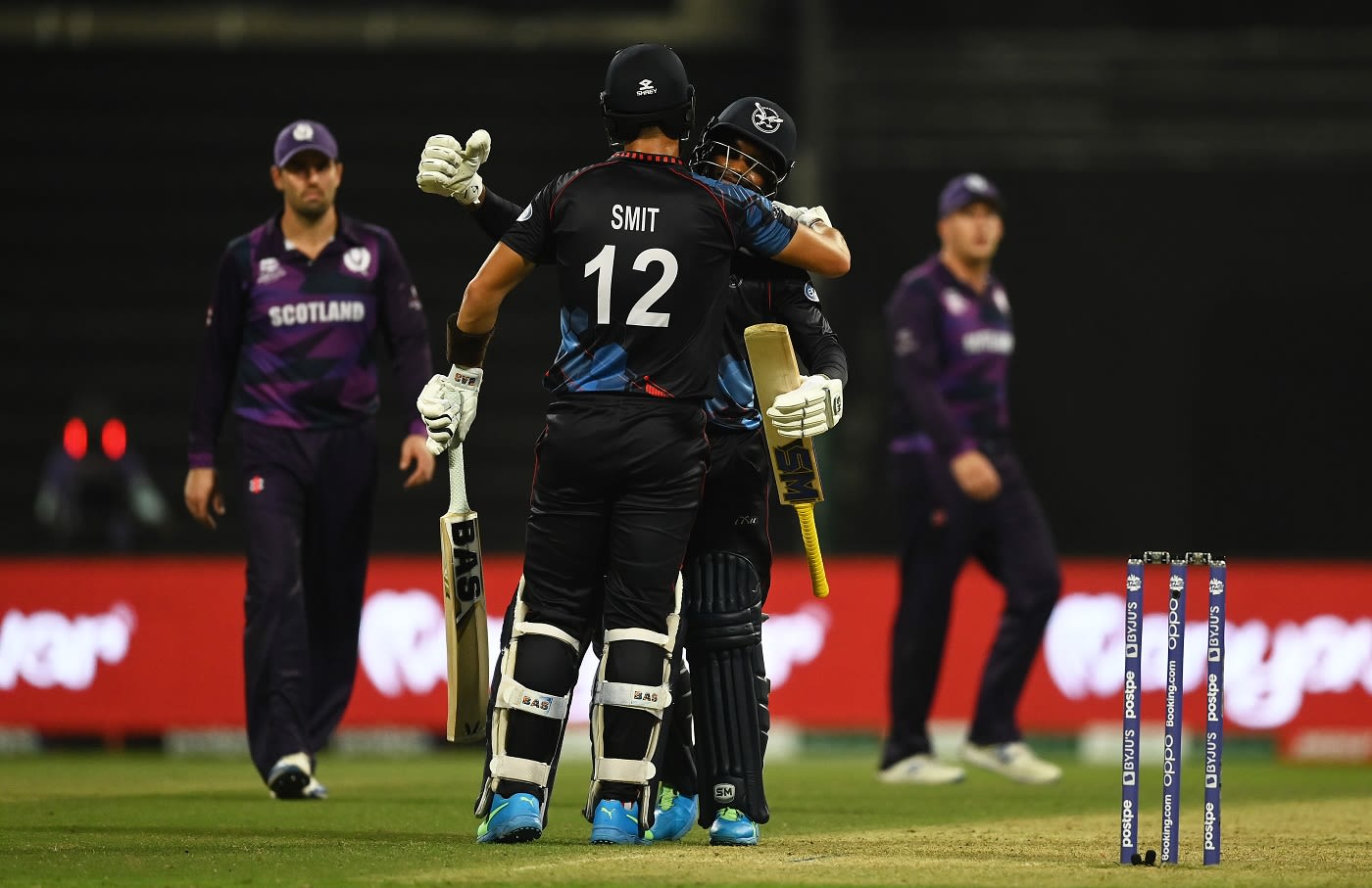Pikky Ya France and JJ Smit embrace after the latter hit the winning six
