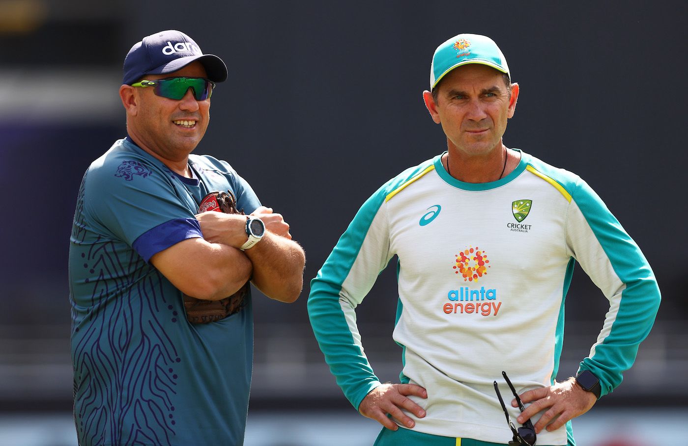 Russell Domingo and Justin Langer, the two coaches, catch up before the game