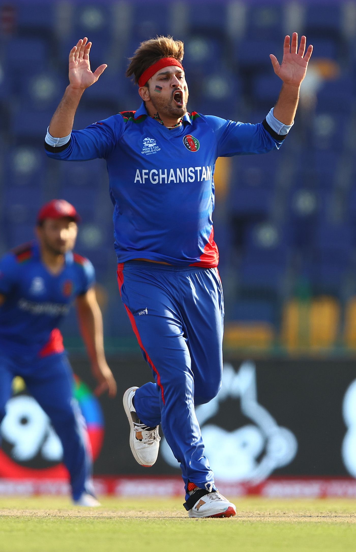 Hamid Hassan reacts after a close shave