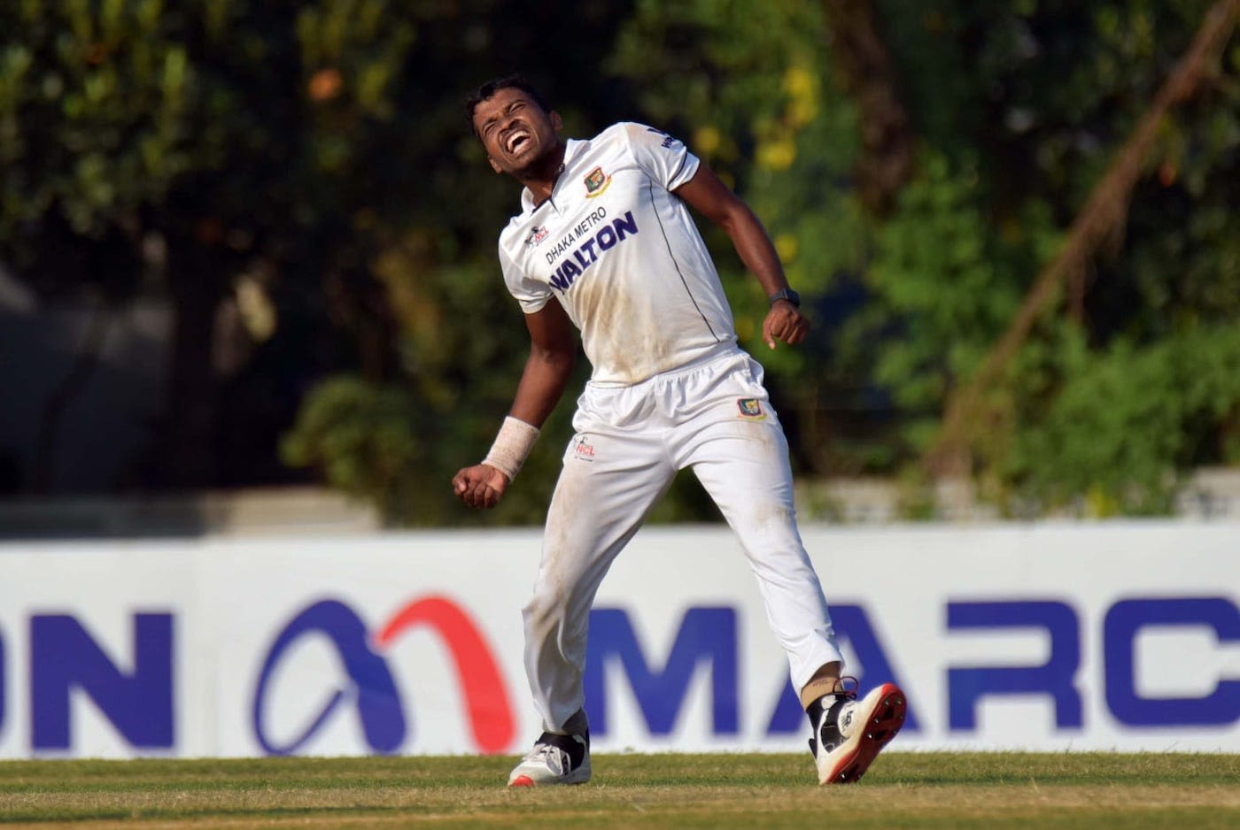 Shohidul Islam celebrates one of his seven wickets against Rajshahi Division