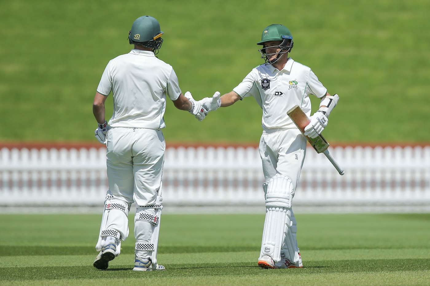 Brad Schmulian of Central Districts celebrates his half century with Dane Cleaver