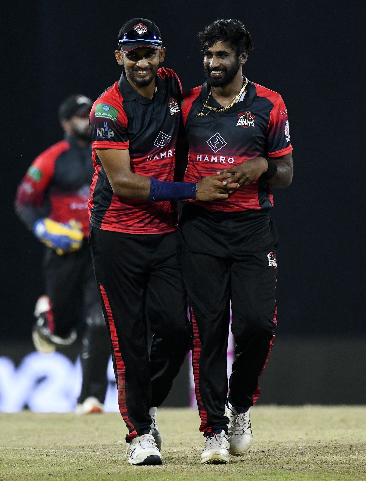 Dambulla Giants' Nuwan Pradeep celebrates a wicket