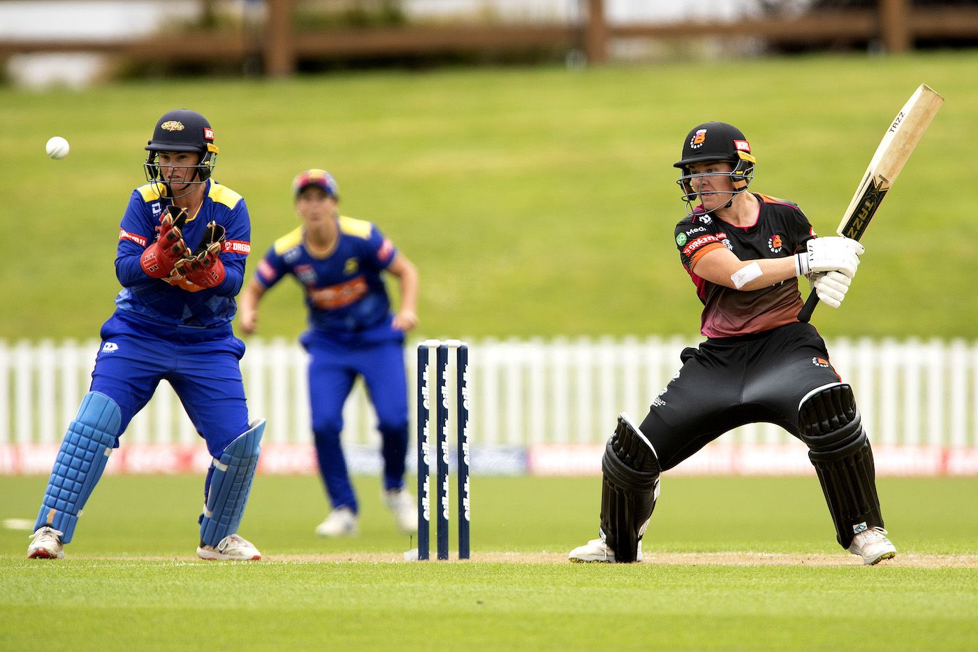 Kate Anderson swats the ball into the off side