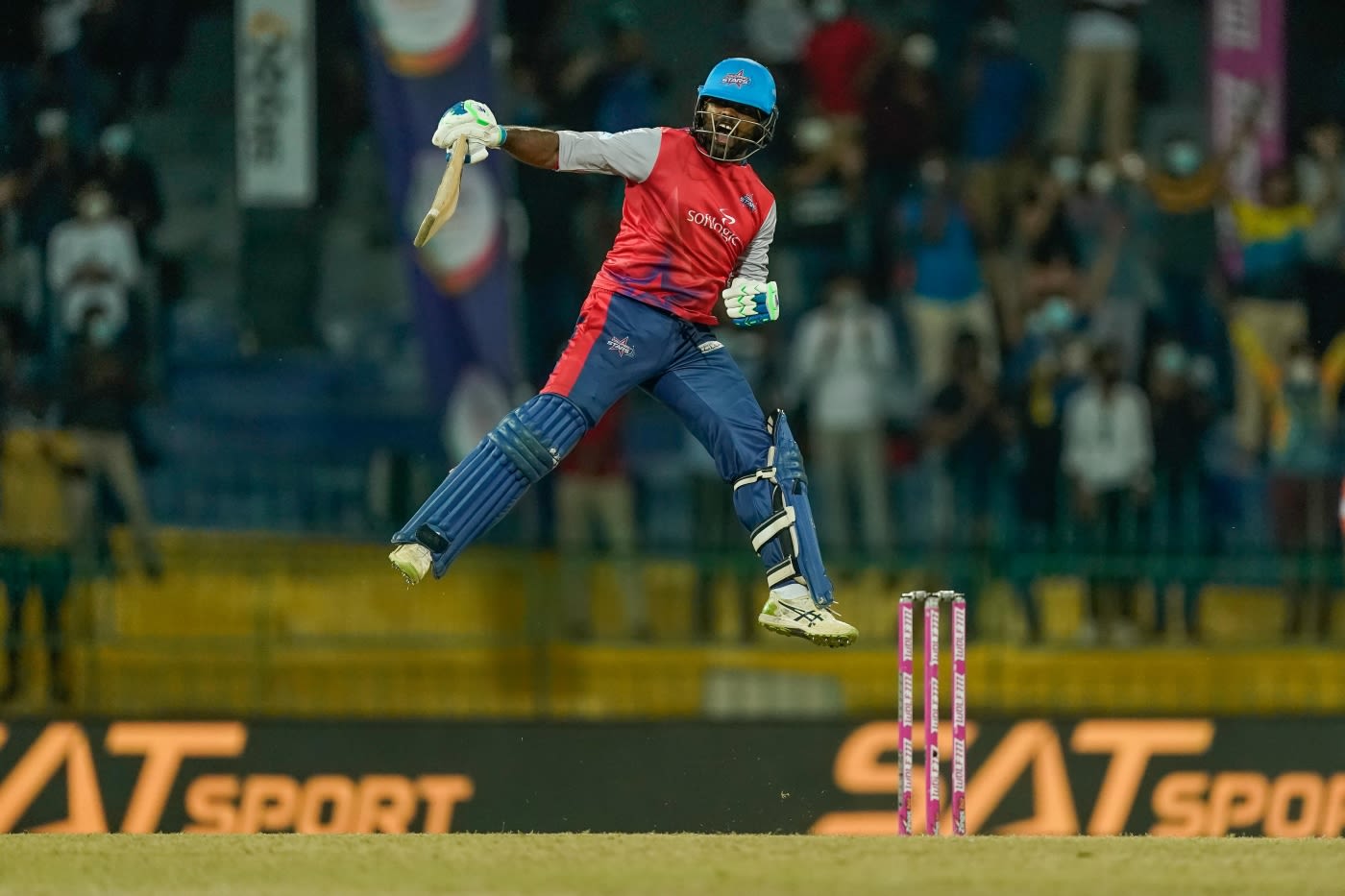 Seekkuge Prasanna is ecstatic after winning the match with three back-to-back sixes in the final over