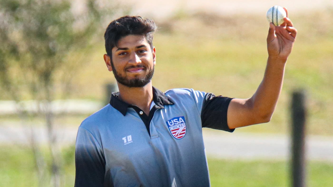 Ali Sheikh holds up the ball after claiming a five-for