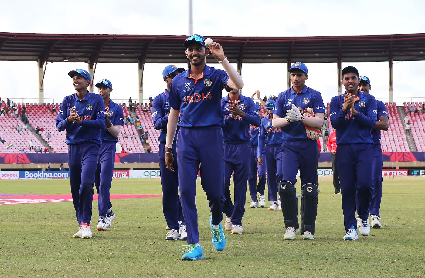 Vicky Ostwal leads his team back after grabbing a five-wicket haul