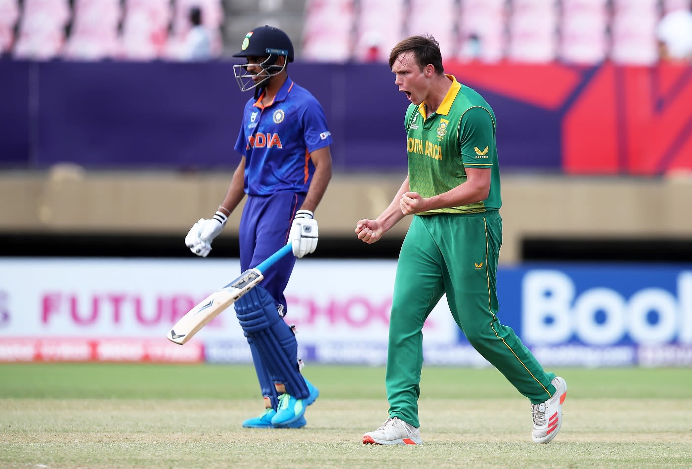 Matthew Boast celebrates after dismissing Dinesh Bana