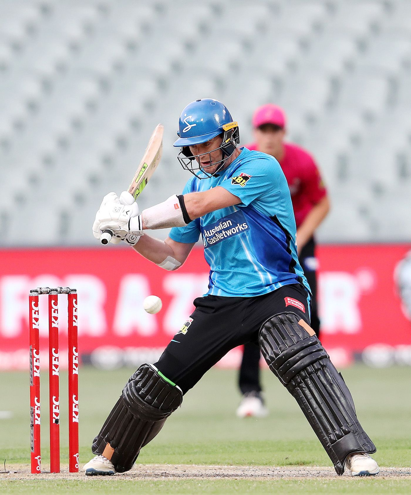 Ian Cockbain makes room to cut during his half-century