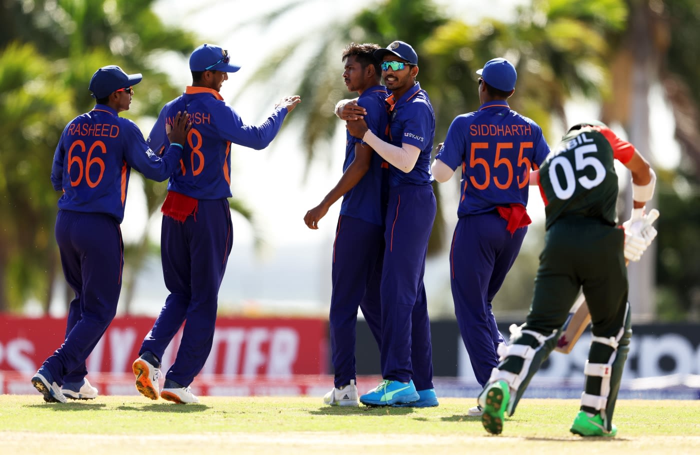India Under-19s get together after one of Ravi Kumar's three strikes against Bangladesh Under-19s