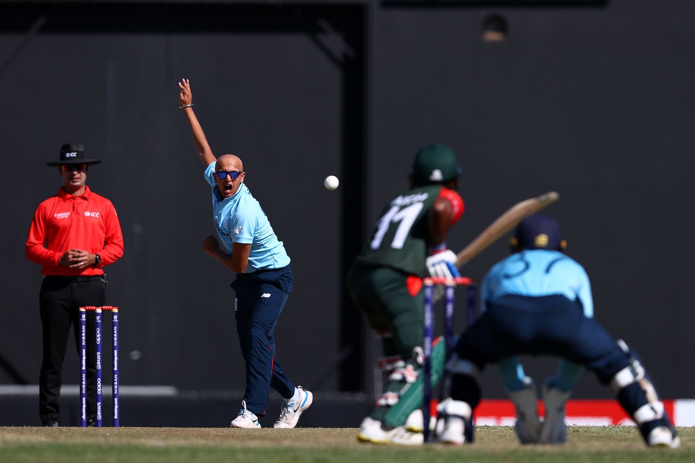 Fateh Singh sends one down against Bangladesh